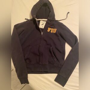 FIU Vintage Hoodie, Thick & Warm. Has spot on back and on sleeve see photos.